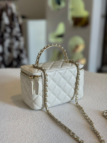 Bolsa Vanity capitoneado blanca