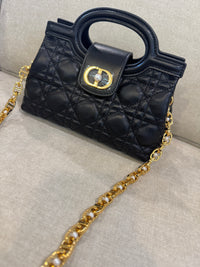 Bolso negro CD MNO