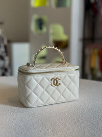 Bolsa Vanity capitoneado blanca