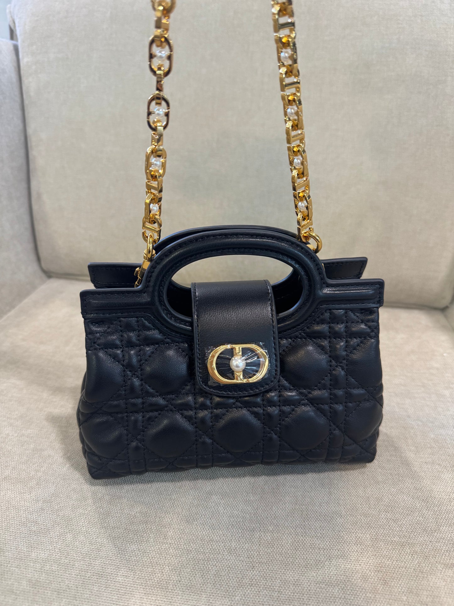 Bolso negro CD MNO