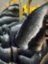 Abrigo peluche negro-blanco