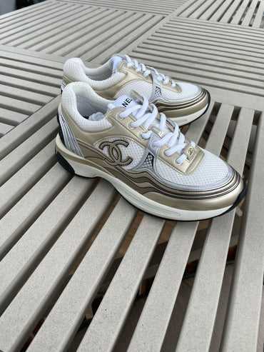Tenis dorado