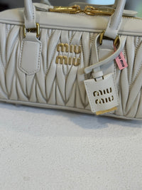 BOLSO BEIGE IUM