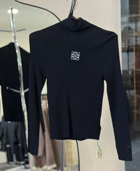 BLUSA CUELLO LOW NEGRA