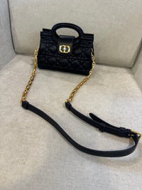 Bolso negro CD MNO